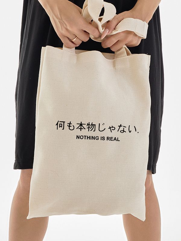 Сумка женская через плечо шоппер с принтом надписью Nothing is real